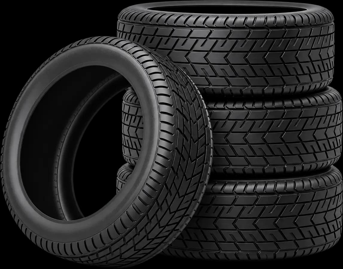 Performance wheel beside a stack of tyres